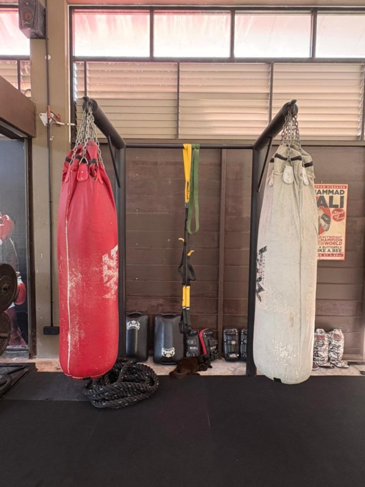 Muay Thai heavy bags, battle ropes and wall pads at Bambu Getaway gym, Langkawi