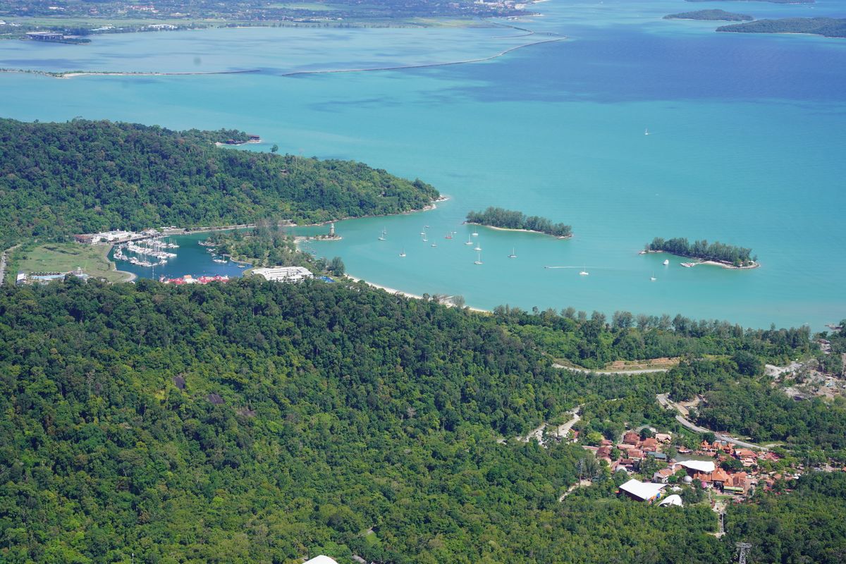Aerial view of Langkawi coastline, marina and forested headlands